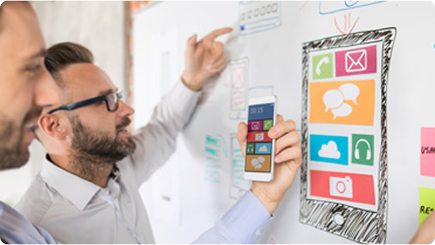 persons looking at charts