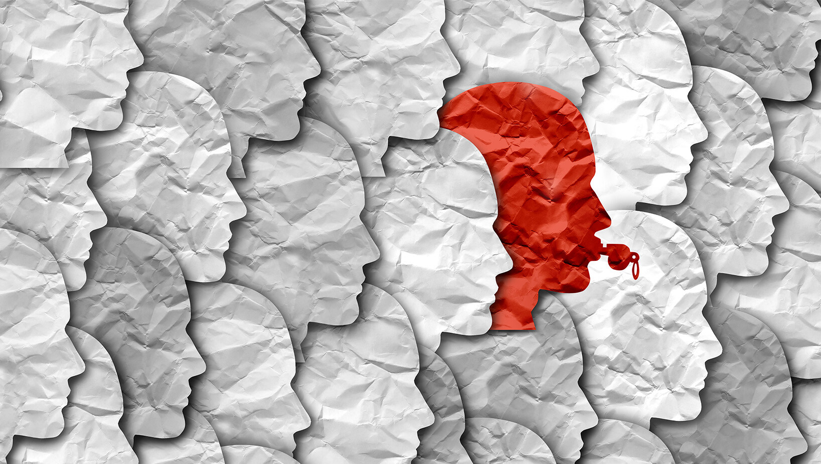 Grafika z konturami głów z papieru.